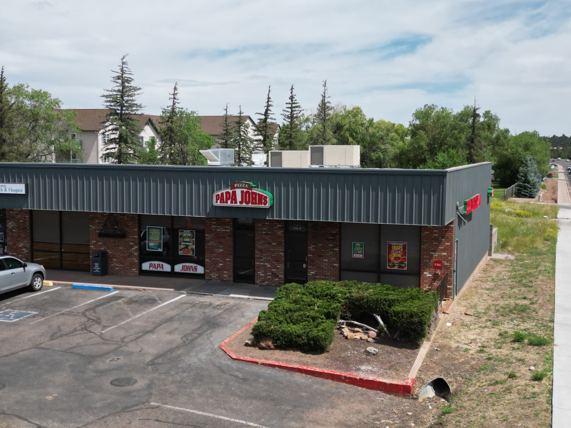 Papa John's — storefront exterior angle