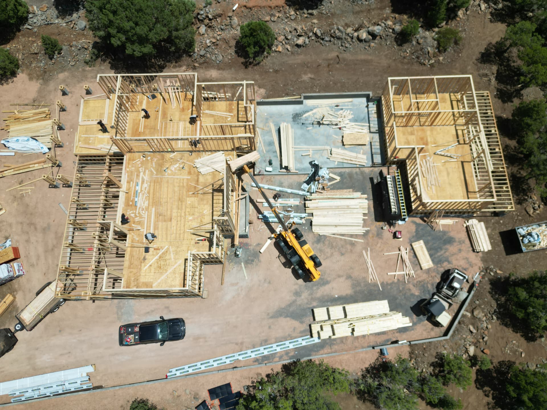 Mountain residence — wall framing going up overhead