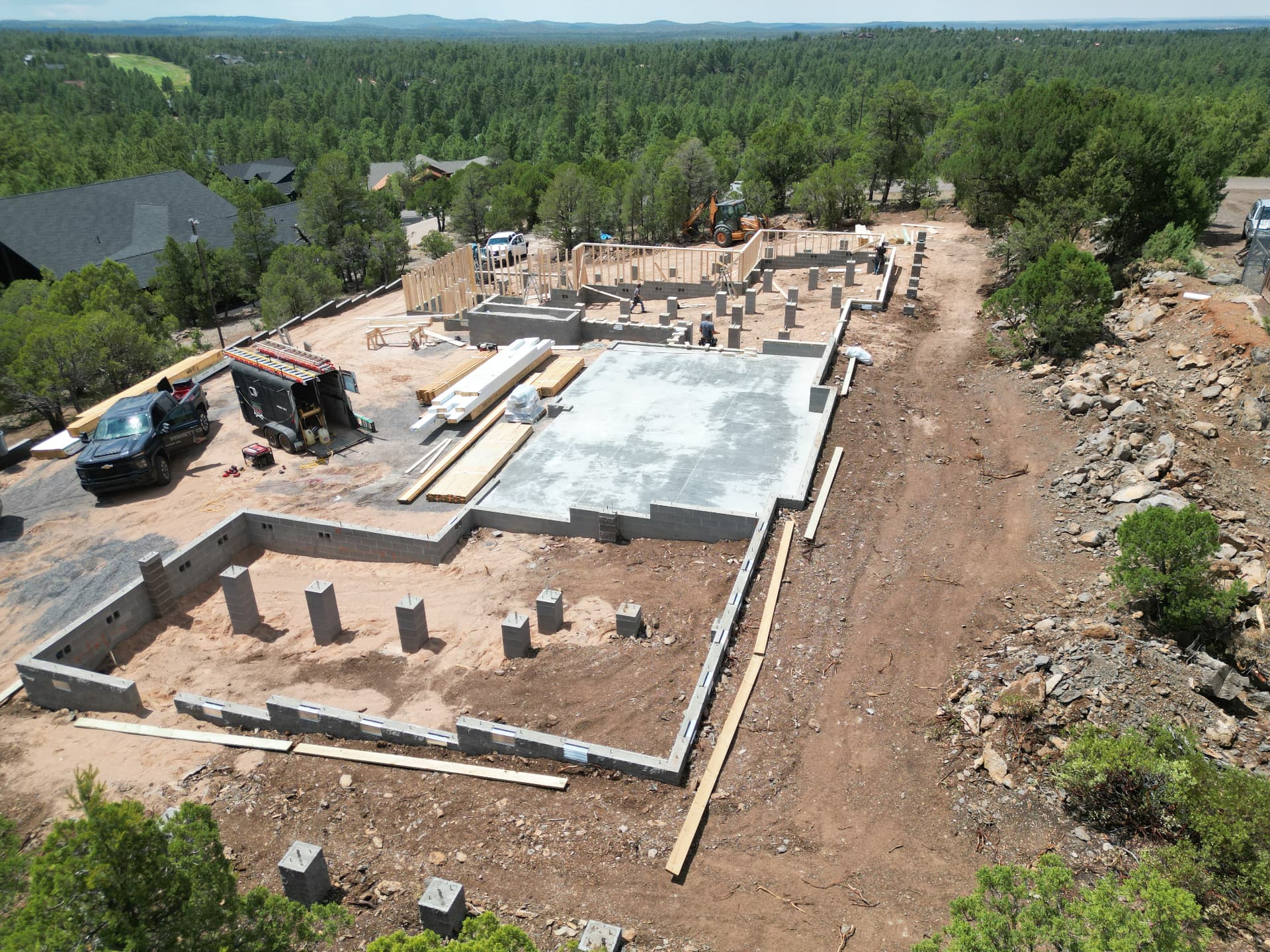 Mountain residence — stem walls and wall framing aerial